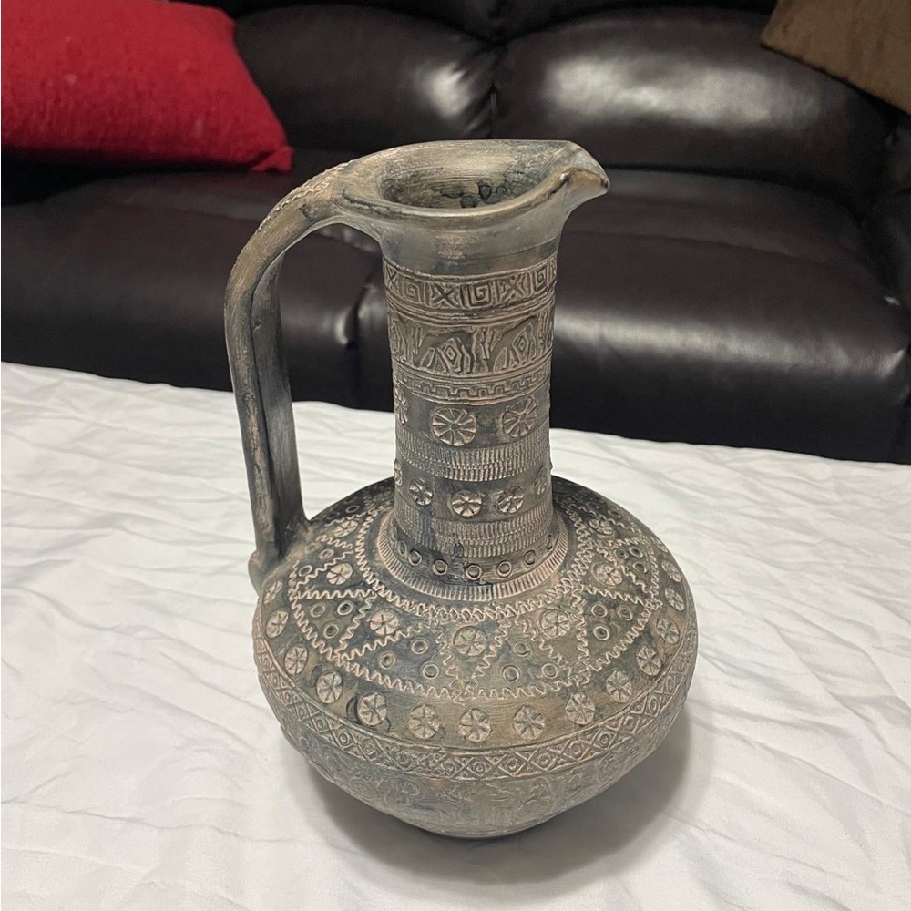 Artisan Ceramic Pitcher with Intricate Patterns
